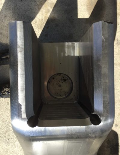 A deep pocket part with deep holes. Only possible to make with special long antivibration tools